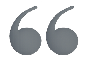 Grey quotation marks as a design element for a quote
