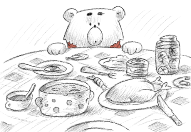 Bamse vid ett bord fullt med mat.
